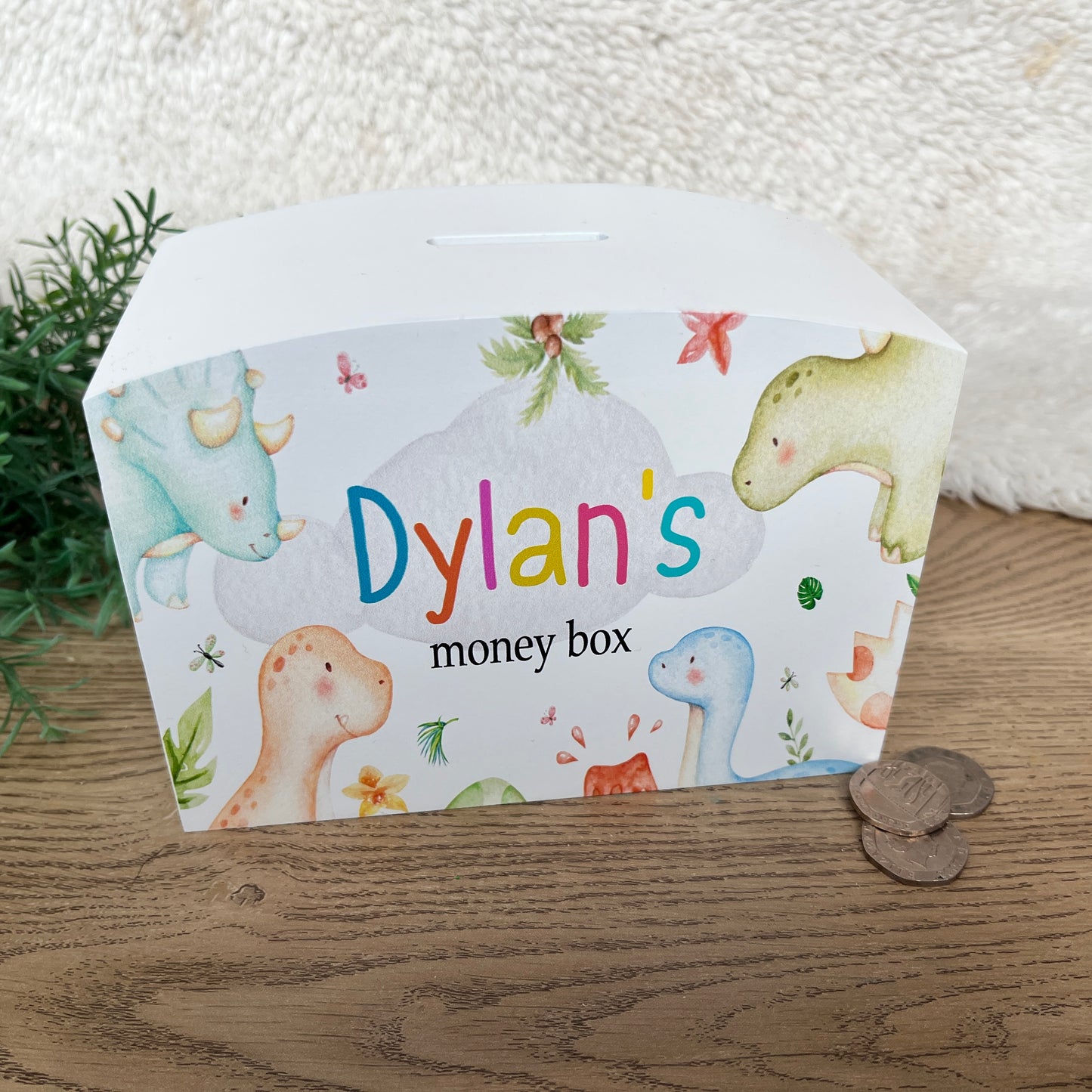 Dinosaur heads money box