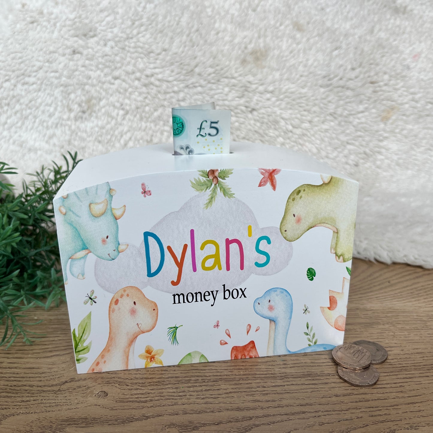 Dinosaur heads money box