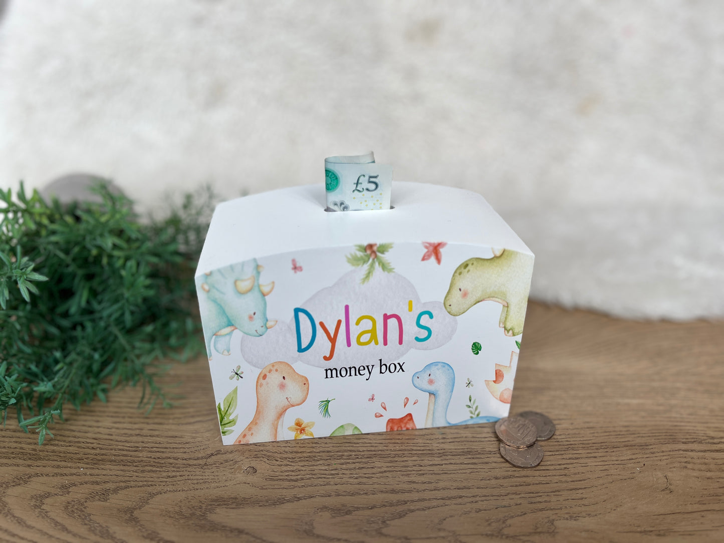 Dinosaur heads money box